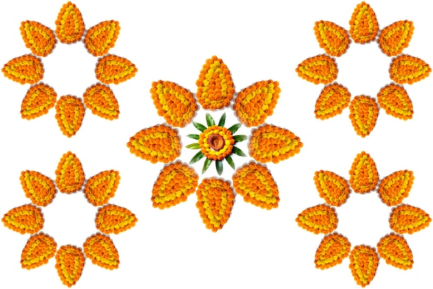 Photo marigold flower rangoli design with oil lamps for diwali festival.