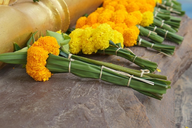 Marigolds lotus flowers are brought to pay homage to the Lord Buddha