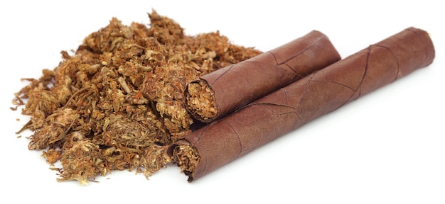 Marijuana as cigar over white background