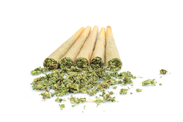 Photo marijuana joint prerolled cone paper on white background roll paper cannabis