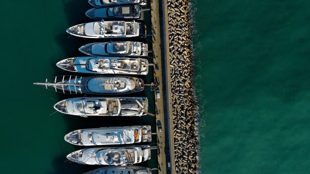 Marina from above and moored yachts and sailboats in it