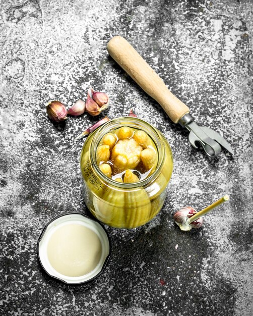 Marinated corn in glass jar.