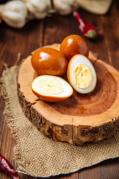 Marinated eggs on the wooden board