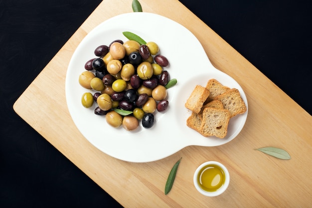 Marinated olives in plate