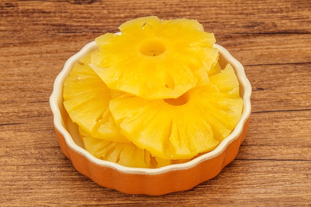 Marinated pineapple rings in the bowl