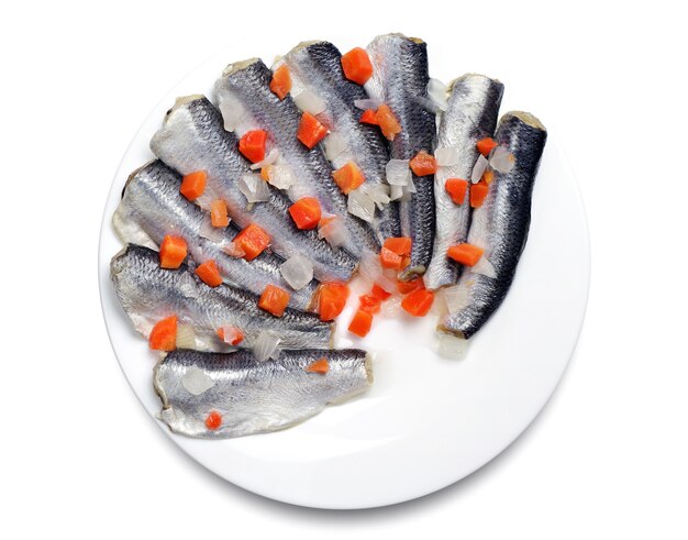 Marinated salted fish in a plate on white background