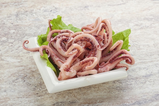 Marinated squid tentacles in the bowl