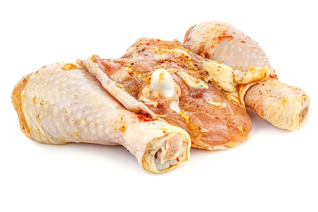 Marinated with spices chicken thigh and chicken drumsticks isolated on white