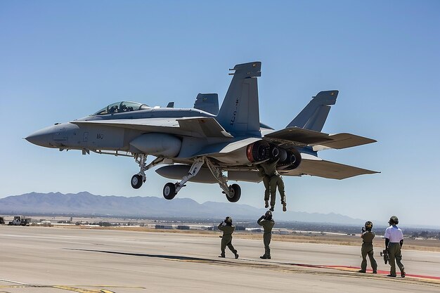 Photo marine aviators and support crew work on fa18 hornets during the air show in miramar ca on oct 3 2015 its the largest military air show worldwide