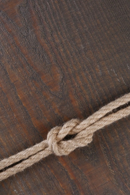 Marine knot on wooden background