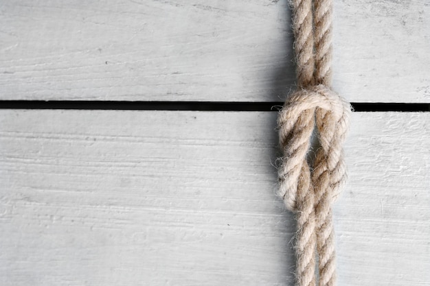 Marine knot on wooden background