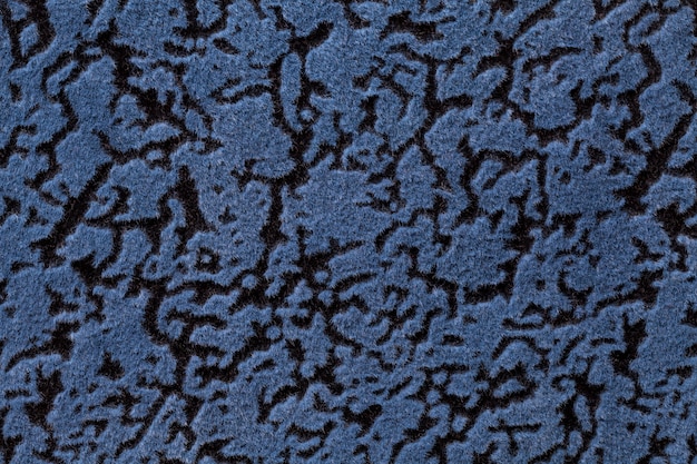 Marineblauwe achtergrond van een zachte bekleding textiel materiaal,