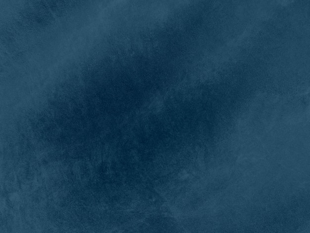 Marineblauwe fluwelen stof textuur gebruikt als achtergrond Lege blauwe stof achtergrond van zacht en glad textielmateriaal Er is ruimte voor tekst