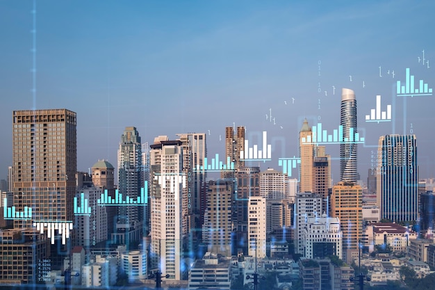 Market behavior graph hologram sunset panoramic city view of bangkok popular location to achieve financial degree in southeast asia the concept of financial data analysis double exposure