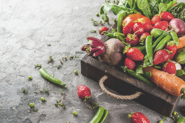 Market. Healthy vegan food. Fresh vegetables, berries, greens and fruits