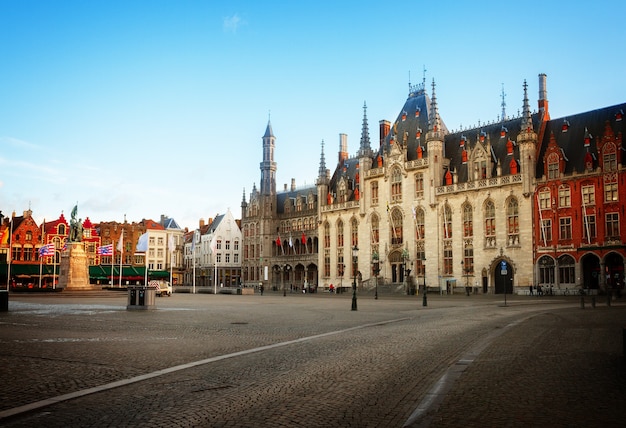 Market Square in old town with city hall, Bruges, Belgium, toned