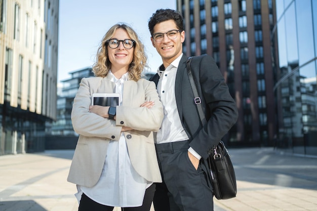 Marketing People A Man And A Woman Work In An Office Using A Computer