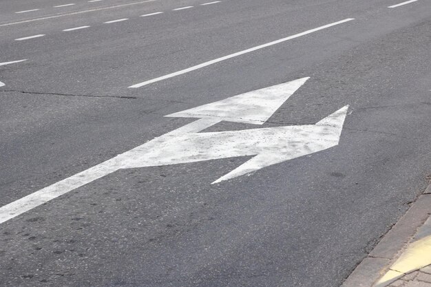 Marking of the arrow pointer on the asphalt road