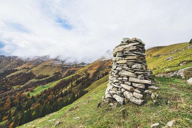 Marks away of stones piled up in the mountains in the Lombardy preAlps Italy