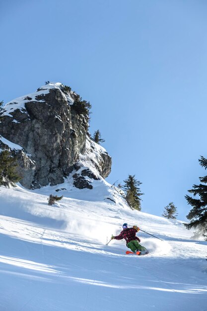 Marmaros The Carpathians UKRAINE March 11 2021 A skier on Black Crows skis descends a steep descent