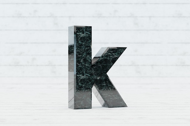 Marmeren 3d letter K kleine letters. Donkergroene marmeren brief op witte houten achtergrond. 3D-gerenderde lettertype karakter.