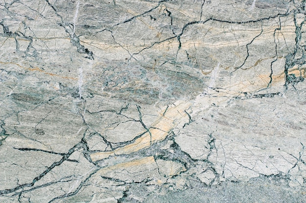 Marmeren steentextuur met gevarieerd patroon met fijne lijnen.
