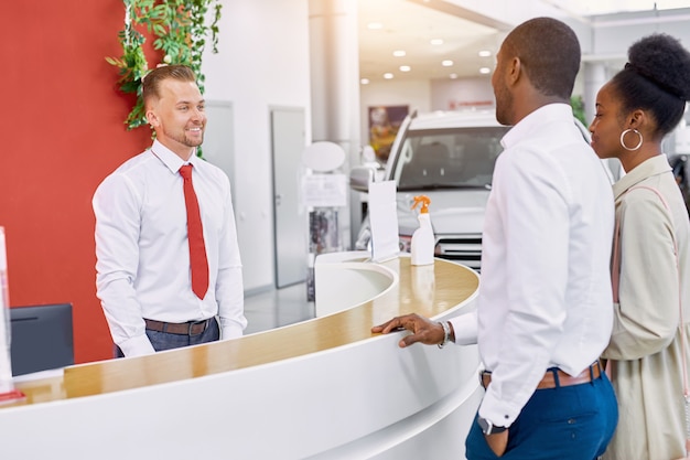 married couple entered modern dealership