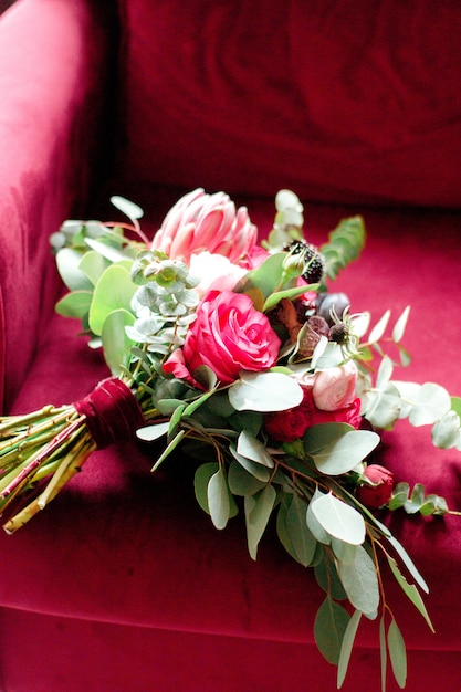 Marsala wedding bouquet on chair