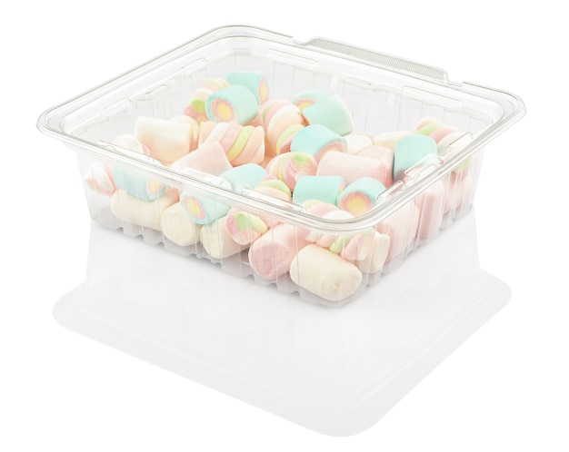 Marshmallow candy in a plastic container isolated