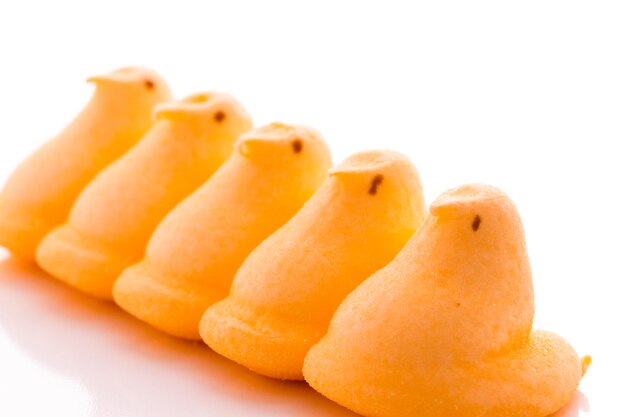 Marshmallow chicks for easter on a white background