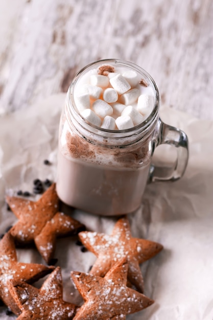 Marshmallow cocoa with ginger biscuits.