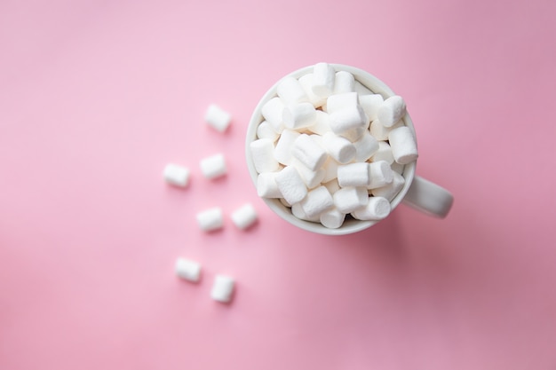 Marshmallow poured from a white mug