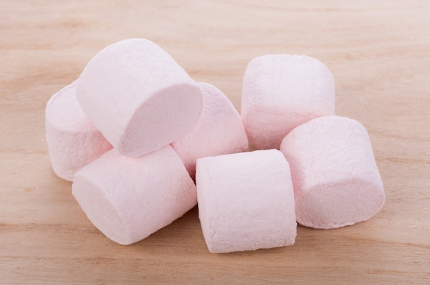 marshmallows on wooden background