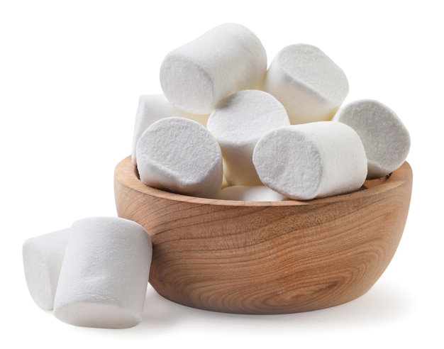 Marshmallows in a wooden plate closeup on a white background Isolated