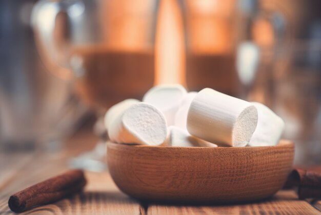 Marshmallows in a wooden plate