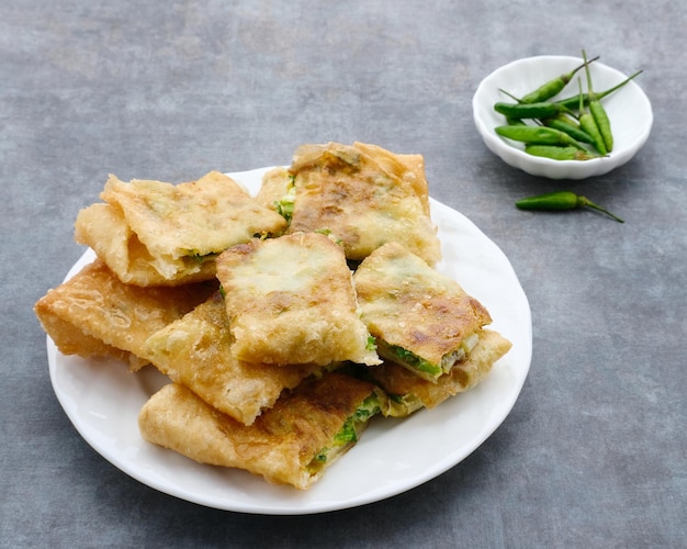 Martabak Martabak Telor or Martabak Telur Savory panfried pastry stuffed with egg meat and spice