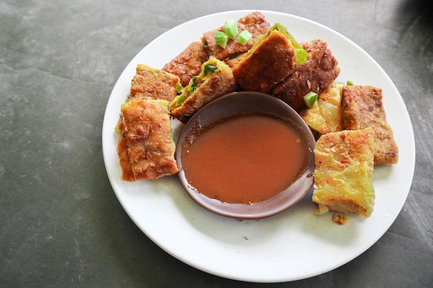 Martabak Telor or Murtabak Telur or mutabbaq Savory panfried pastry stuffed with egg meat and spices Martabak Telur is one of Indonesia street food