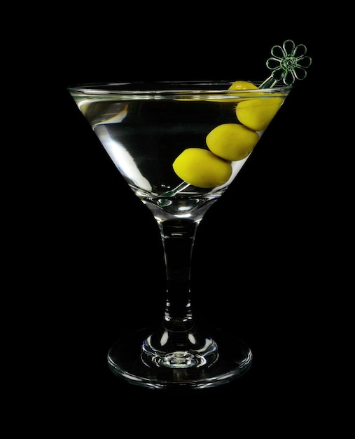 Martini cocktail with olives on a black background closeup