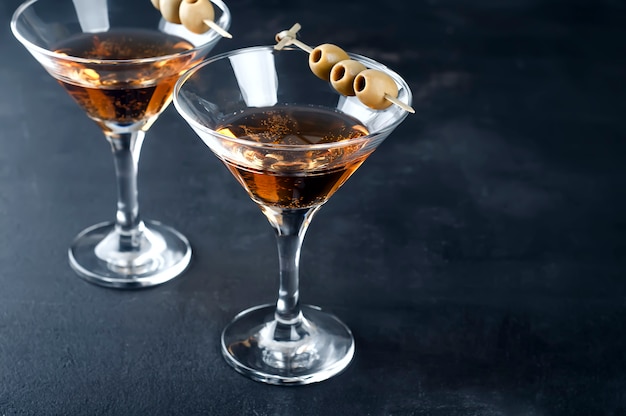 Martini glass and olives