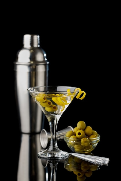 Martini vermouth drink isolated on black background