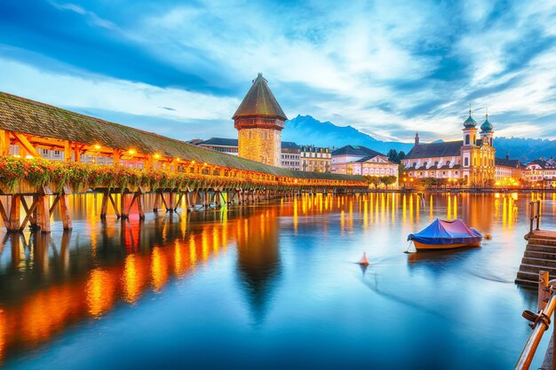 Marvelous historic city center of Lucerne with famous buildings and old wooden Chapel Bridge Kapellbrucke