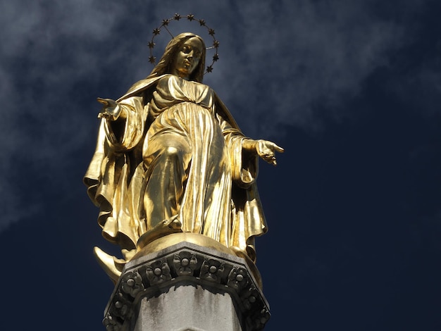 mary gold statue in front of cathedral Zagreb Croatia architecture city town building