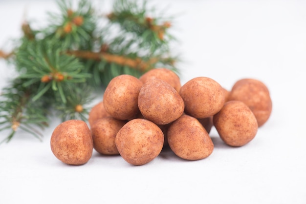 Marzipan potatoes, in german called Marzipankartoffeln, with cacao powder, sweets for christmas