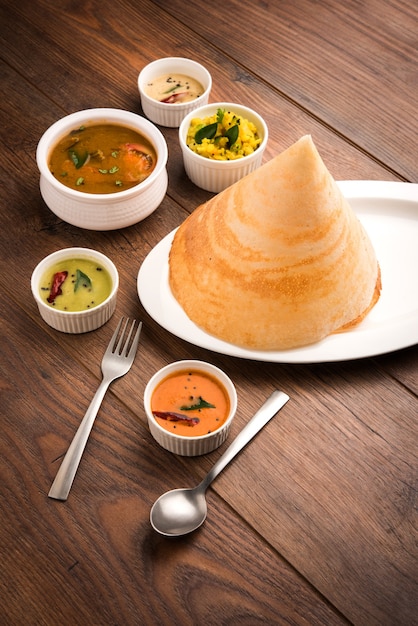 Masala dosa with chutney and sambar and potato sabzi Cone triangle or roll shap