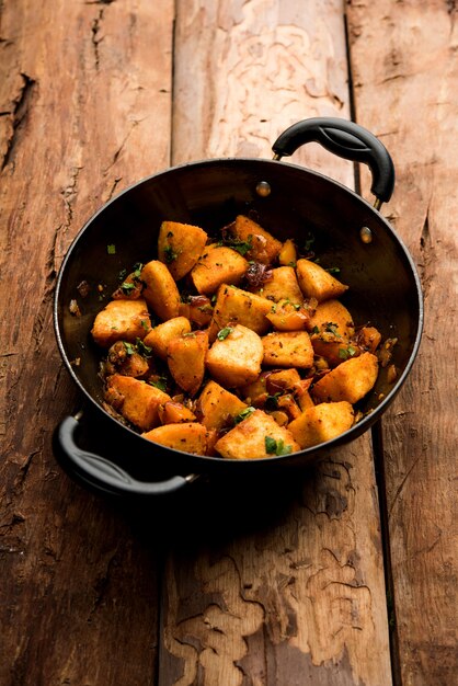 Masala fried Idlies - south indian Snack made using with leftover idly served with tomato ketchup. selective focus