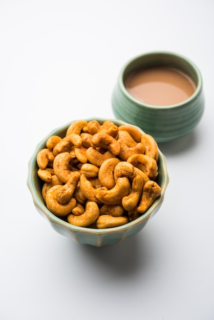 Masala Kaju or spicy Cashew in a bowl. Popular festival snack from India, asia, also known as Chakna recipe