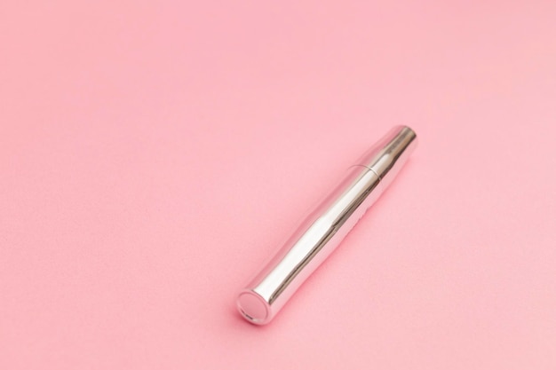 Mascara on a pink background