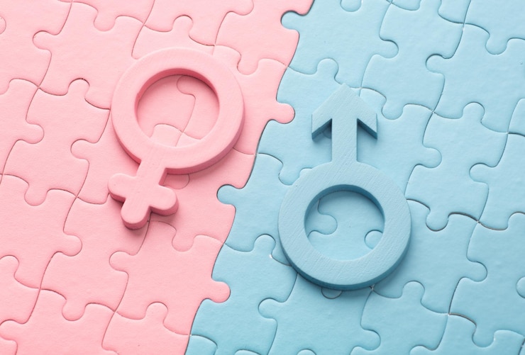 Photo masculine and feminine lie on puzzles concept of sex couple family