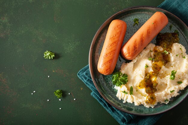 Mashed cauliflower and grilled sausages. ketogenic paleo diet lunch