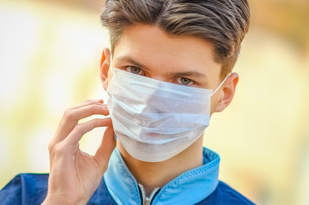 Masked man from coronavirus and air. Protection against PM 2.5 air polluted from thea  virus in Europe and Asia